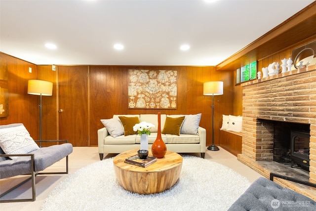 7008 25th Ave NE, Seattle, WA 98115 - living area featuring wooden walls, a fireplace, and recessed lighting
