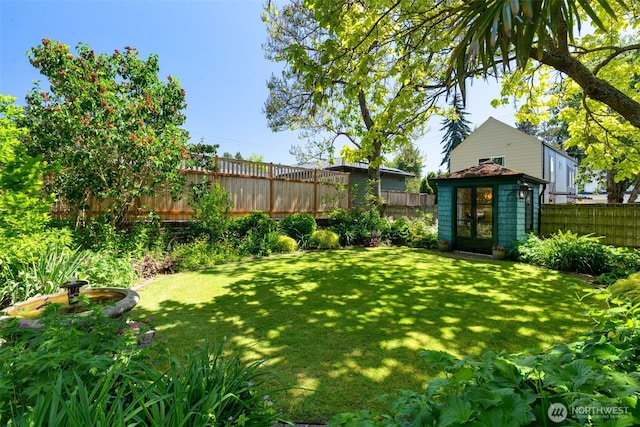 7008 25th Ave NE, Seattle, WA 98115 - view of yard featuring an outbuilding and french doors