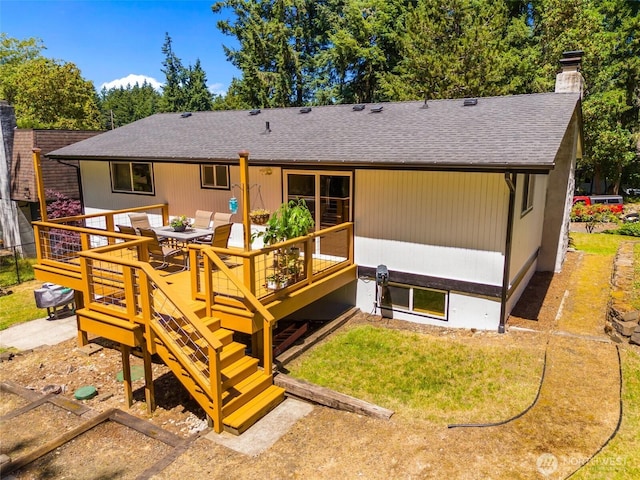 9541 Joann Ave NE, Olympia, WA 98516 - rear view of house with a chimney, a shingled roof, and a deck