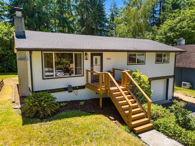 9541 Joann Ave NE, Olympia, WA 98516 - ranch-style home featuring a chimney, a garage, a shingled roof, and driveway