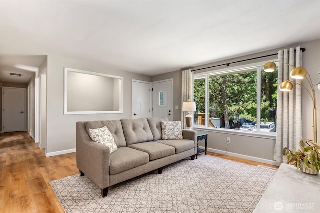 9541 Joann Ave NE, Olympia, WA 98516 - living room with light wood-style floors and baseboards