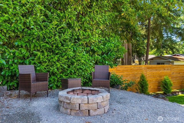 9541 Joann Ave NE, Olympia, WA 98516 - view of patio / terrace featuring an outdoor fire pit