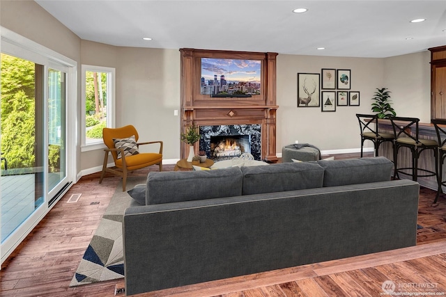 926 Olympic Ave, Edmonds, WA 98020 - living room featuring a fireplace, recessed lighting, and wood finished floors