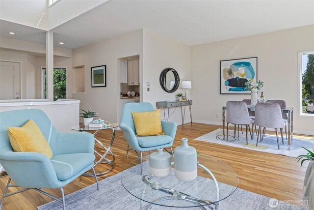 101 NW 58th St Unit 9, Seattle, WA 98107 - living room featuring wood finished floors, recessed lighting, and baseboards