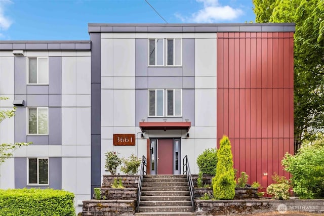 3661 Phinney Ave N Unit 208, Seattle, WA 98103 - view of front facade featuring stucco siding