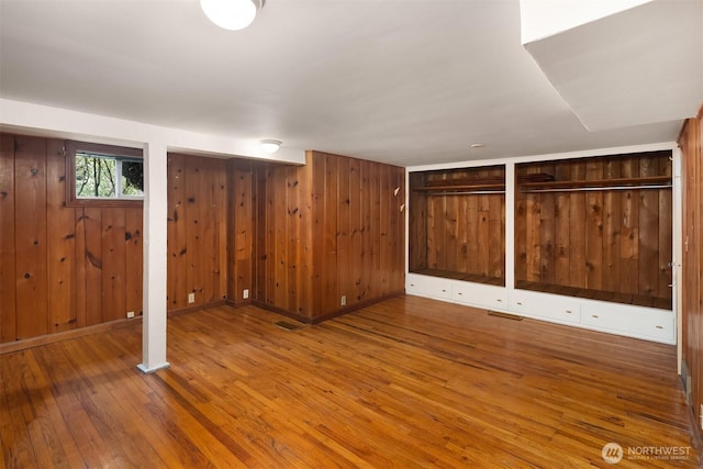 6522 42nd Ave NE, Seattle, WA 98115 - basement with wood-type flooring and wood walls
