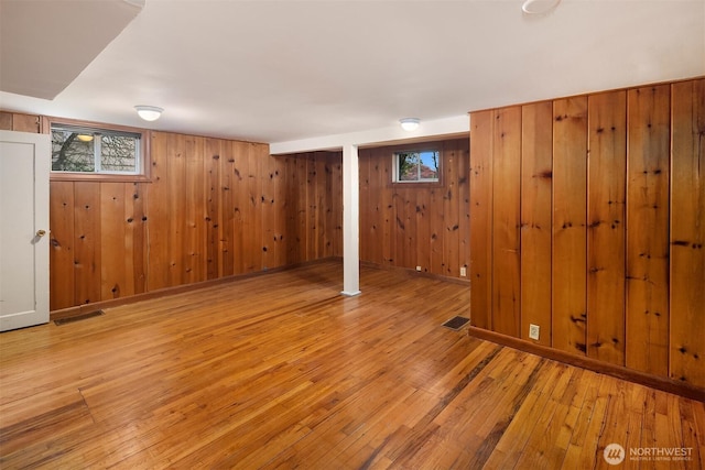6522 42nd Ave NE, Seattle, WA 98115 - below grade area with light wood-style floors and wood walls