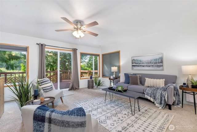 5810 E Mason Lake Dr W, Grapeview, WA 98546 - carpeted living area featuring a ceiling fan
