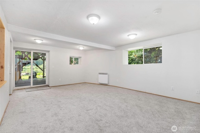5810 E Mason Lake Dr W, Grapeview, WA 98546 - spare room with plenty of natural light, carpet, heating unit, and baseboards