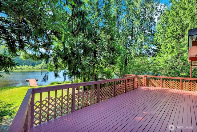 5810 E Mason Lake Dr W, Grapeview, WA 98546 - wooden terrace with a water view and a lawn