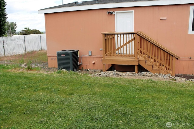 153 NW Quincy Pl, Soap Lake, WA 98851 - rear view of property with cooling unit and a wooden deck