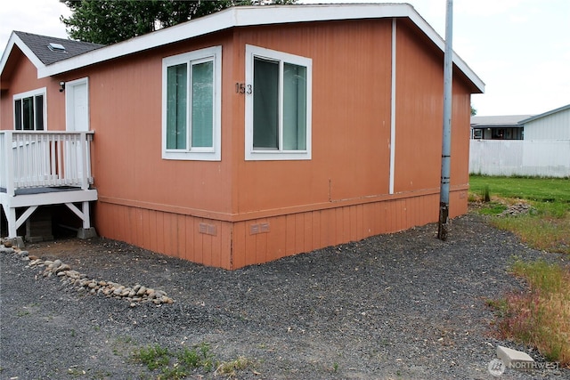 153 NW Quincy Pl, Soap Lake, WA 98851 - view of home's exterior featuring a wooden deck and crawl space