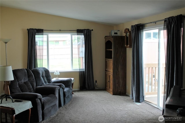 153 NW Quincy Pl, Soap Lake, WA 98851 - sitting room featuring light carpet and lofted ceiling