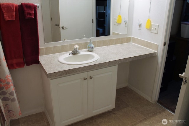 153 NW Quincy Pl, Soap Lake, WA 98851 - full bath featuring vanity, tile patterned flooring, and baseboards