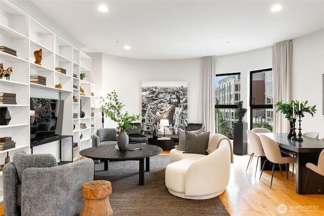615 E Pike St Unit 306, Seattle, WA 98122 - living room with light wood finished floors and recessed lighting