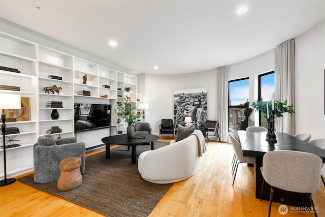 615 E Pike St Unit 306, Seattle, WA 98122 - living area featuring wood finished floors and recessed lighting