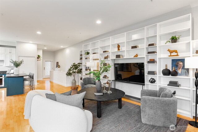 615 E Pike St Unit 306, Seattle, WA 98122 - living area with light wood-type flooring and recessed lighting