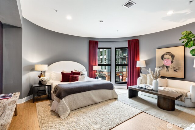 615 E Pike St Unit 306, Seattle, WA 98122 - bedroom featuring recessed lighting and wood finished floors
