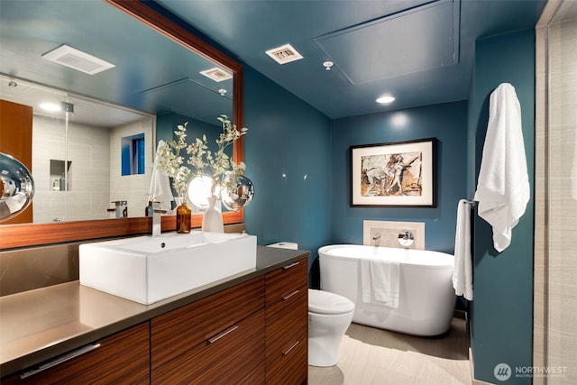615 E Pike St Unit 306, Seattle, WA 98122 - bathroom with a freestanding bath and vanity