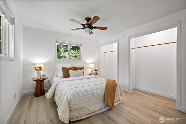 1315 SW 310th St, Federal Way, WA 98023 - bedroom featuring light wood-style floors, baseboards, and ceiling fan