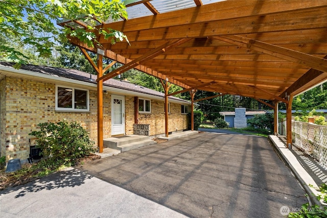 1315 SW 310th St, Federal Way, WA 98023 - view of patio / terrace featuring a carport and driveway