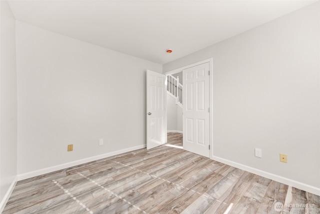 35426 8th Ave SW, Federal Way, WA 98023 - unfurnished bedroom with light wood-type flooring and baseboards