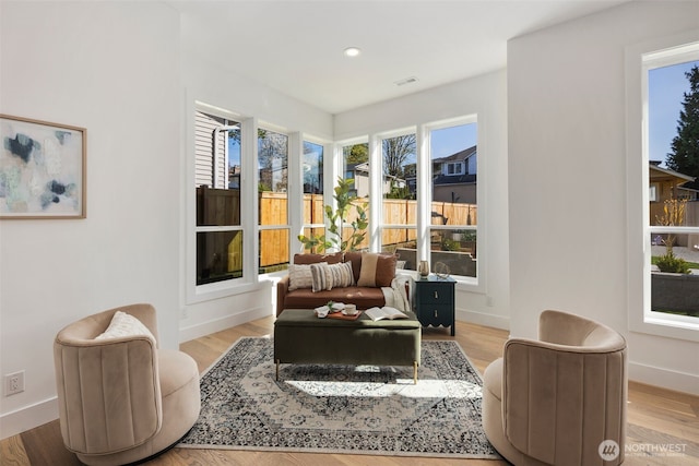 1002 N 31st St, Renton, WA 98056 - sitting room with recessed lighting, baseboards, and wood finished floors