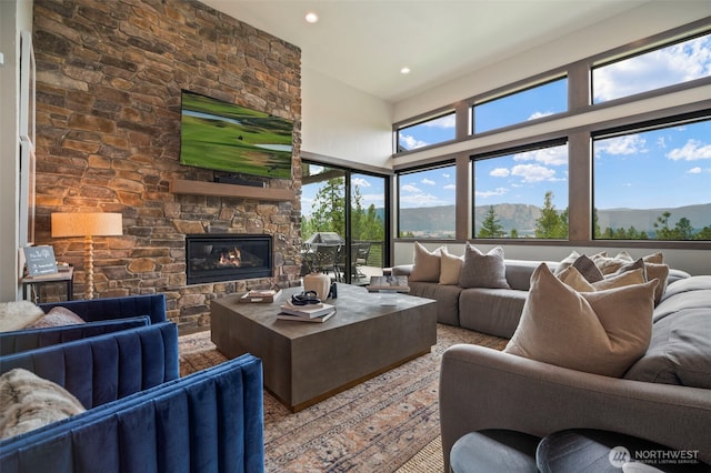 1450 Creekside Rd, Cle Elum, WA 98922 - living area with a fireplace, recessed lighting, and a mountain view