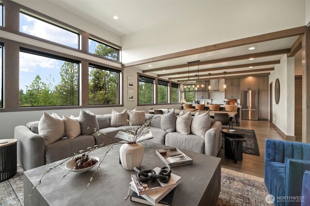 1450 Creekside Rd, Cle Elum, WA 98922 - living area featuring wood finished floors, plenty of natural light, beamed ceiling, recessed lighting, and a chandelier