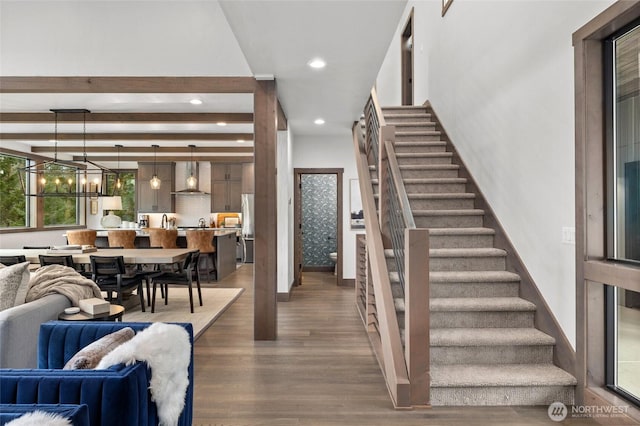 1450 Creekside Rd, Cle Elum, WA 98922 - staircase featuring wood finished floors, recessed lighting, and a chandelier