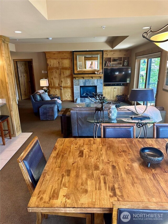 3770 Suncadia Trl Unit 110, Cle Elum, WA 98922 - carpeted dining area featuring a premium fireplace, built in features, and recessed lighting