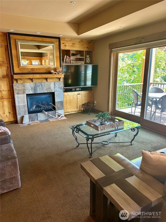 3770 Suncadia Trl Unit 110, Cle Elum, WA 98922 - carpeted living area featuring a high end fireplace