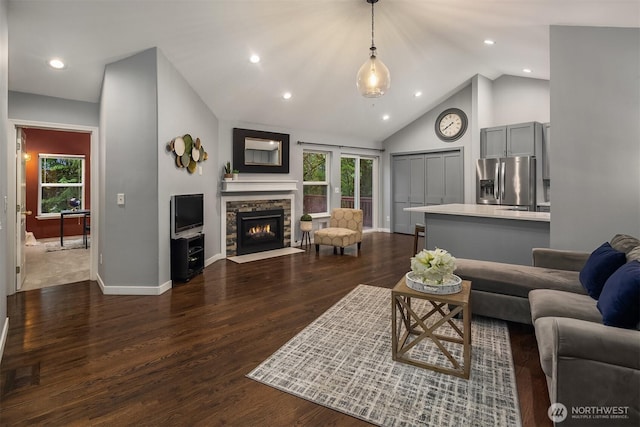 14566 86th Pl NE, Kenmore, WA 98028 - living room with a fireplace, dark wood-style flooring, recessed lighting, high vaulted ceiling, and baseboards