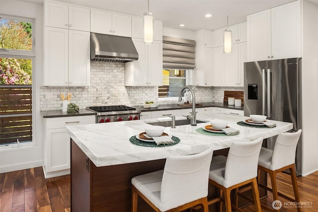 5619 89th Ave SE, Mercer Island, WA 98040 - kitchen with ventilation hood, a sink, stainless steel fridge with ice dispenser, plenty of natural light, and recessed lighting