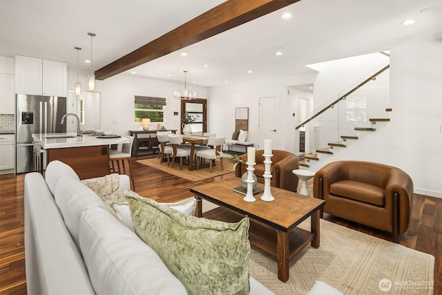 5619 89th Ave SE, Mercer Island, WA 98040 - living area featuring dark wood finished floors, recessed lighting, a chandelier, stairway, and beam ceiling
