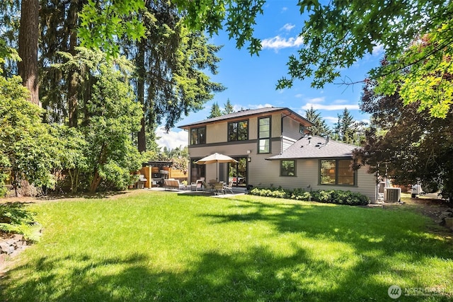 5619 89th Ave SE, Mercer Island, WA 98040 - back of house with a patio, a lawn, and central AC unit