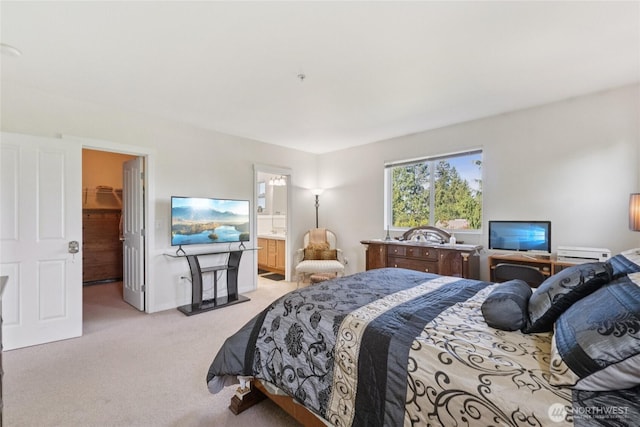 4118 148th St SW Unit A4, Lynnwood, WA 98087 - bedroom with light colored carpet, a walk in closet, and ensuite bathroom