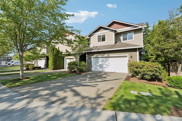 4118 148th St SW Unit A4, Lynnwood, WA 98087 - view of front of house with asphalt driveway and a garage