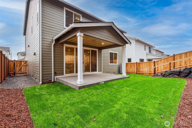 20320 150th St E, Bonney Lake, WA 98391 - back of property with a patio and a gate