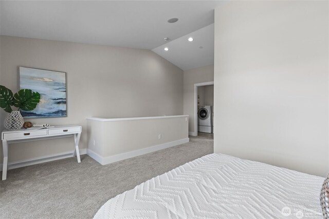 31 Etruria St Unit B, Seattle, WA 98109 - bedroom with washer / clothes dryer, carpet floors, vaulted ceiling, recessed lighting, and baseboards