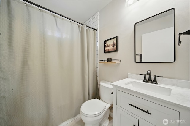 1511 Howard St, Walla Walla, WA 99362 - bathroom with toilet, vanity, and curtained shower