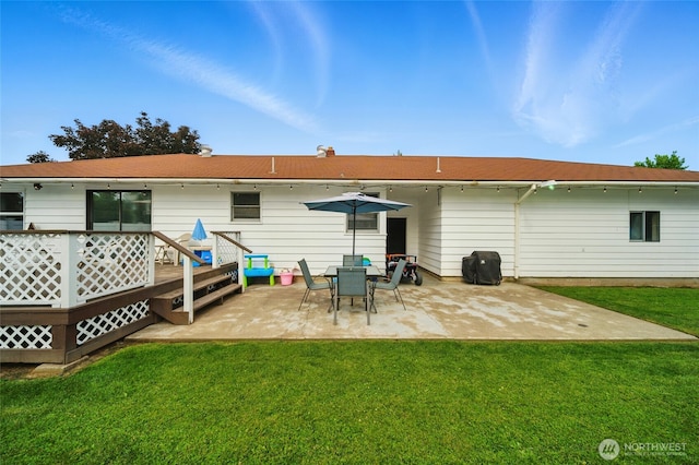 1511 Howard St, Walla Walla, WA 99362 - back of house featuring a deck, a yard, and a patio