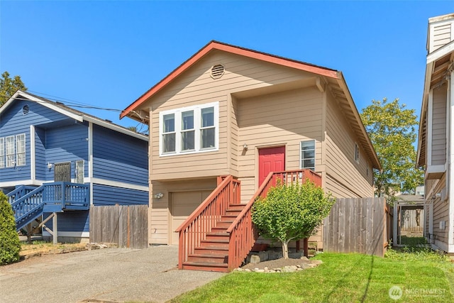 12422 2nd Ave SW, Burien, WA 98146 - view of front facade with asphalt driveway, an attached garage, and stairs
