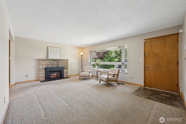29922 5th Ave SW, Federal Way, WA 98023 - living room featuring carpet, a fireplace, a textured ceiling, and baseboards
