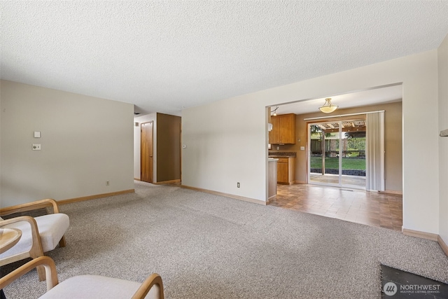 29922 5th Ave SW, Federal Way, WA 98023 - living room featuring light carpet, baseboards, and a textured ceiling