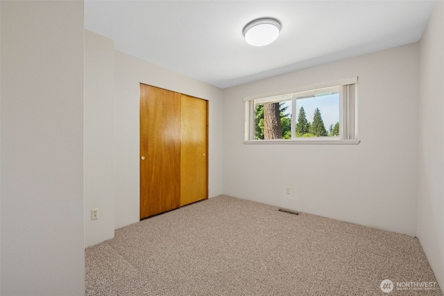29922 5th Ave SW, Federal Way, WA 98023 - unfurnished bedroom with carpet flooring and a closet