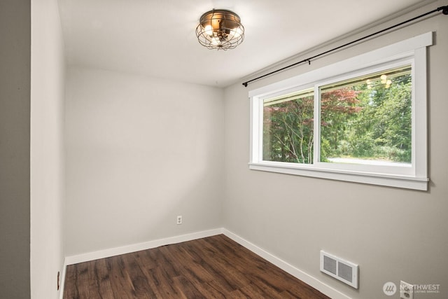 924 1st St, Sultan, WA 98294 - unfurnished room with dark wood-type flooring and baseboards