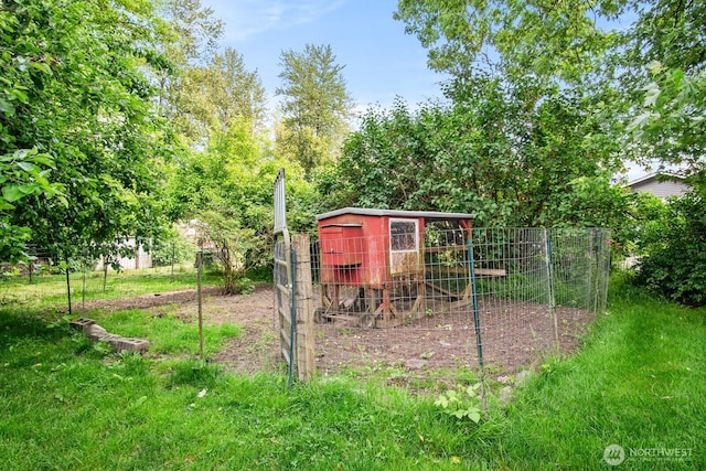 924 1st St, Sultan, WA 98294 - view of yard with exterior structure and an outbuilding