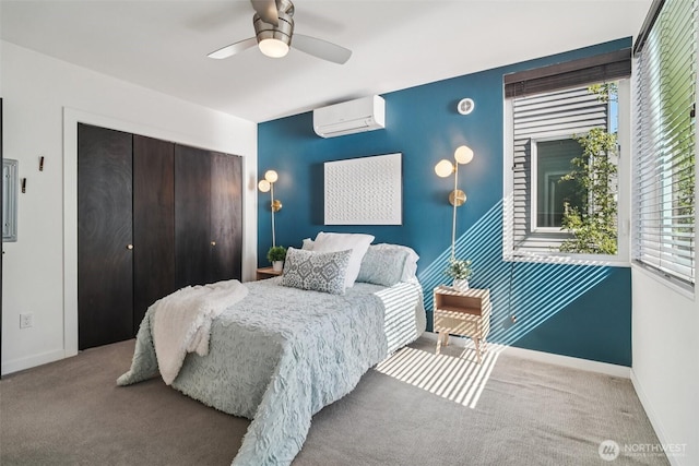 917 29th Ave S, Seattle, WA 98144 - carpeted bedroom featuring a wall mounted AC, a closet, and ceiling fan