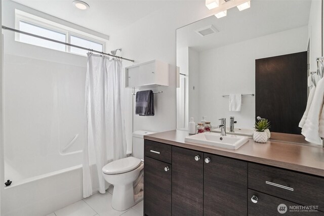 917 29th Ave S, Seattle, WA 98144 - bathroom with vanity, tile patterned flooring, and shower / tub combo with curtain